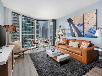 Grey-tone plank flooring throughout